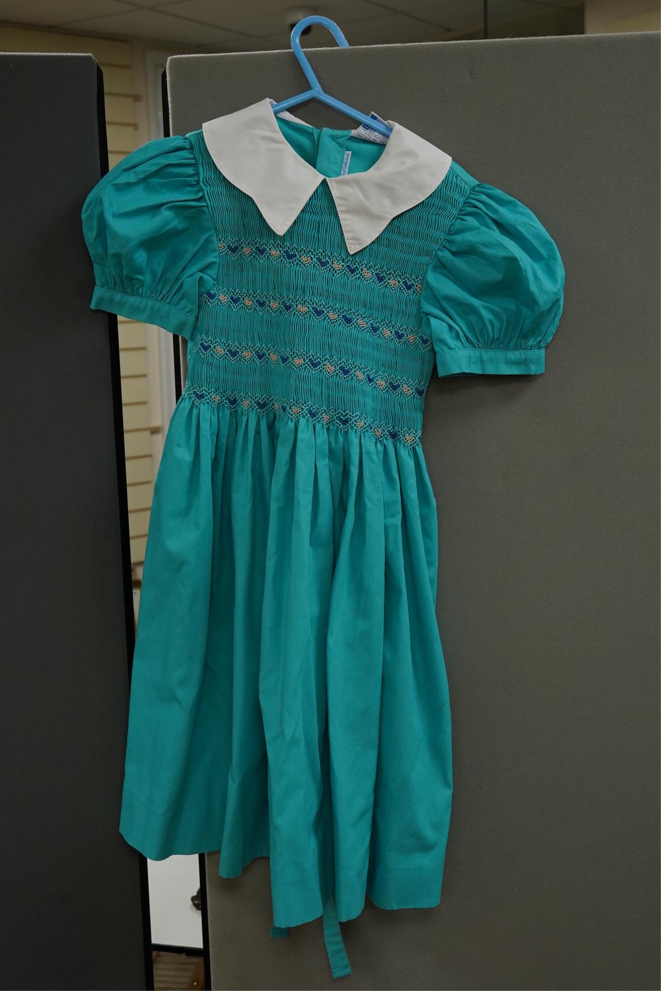 Twelve assorted 1980’s vintage children's dresses up to age eight, some hand smocked to include Harrods Belart, Chantel (including bell in hem), Michael de Leon, Heskia
